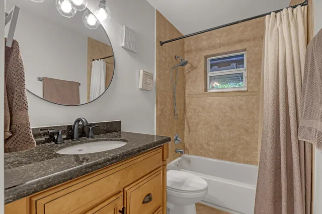 front view of a house with a garden