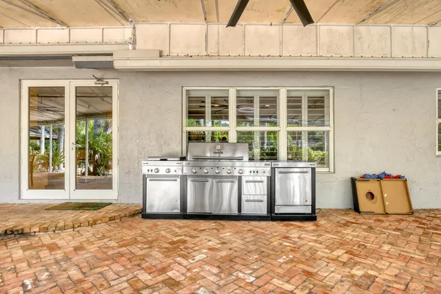 a bathroom with a sink a mirror and a vanity