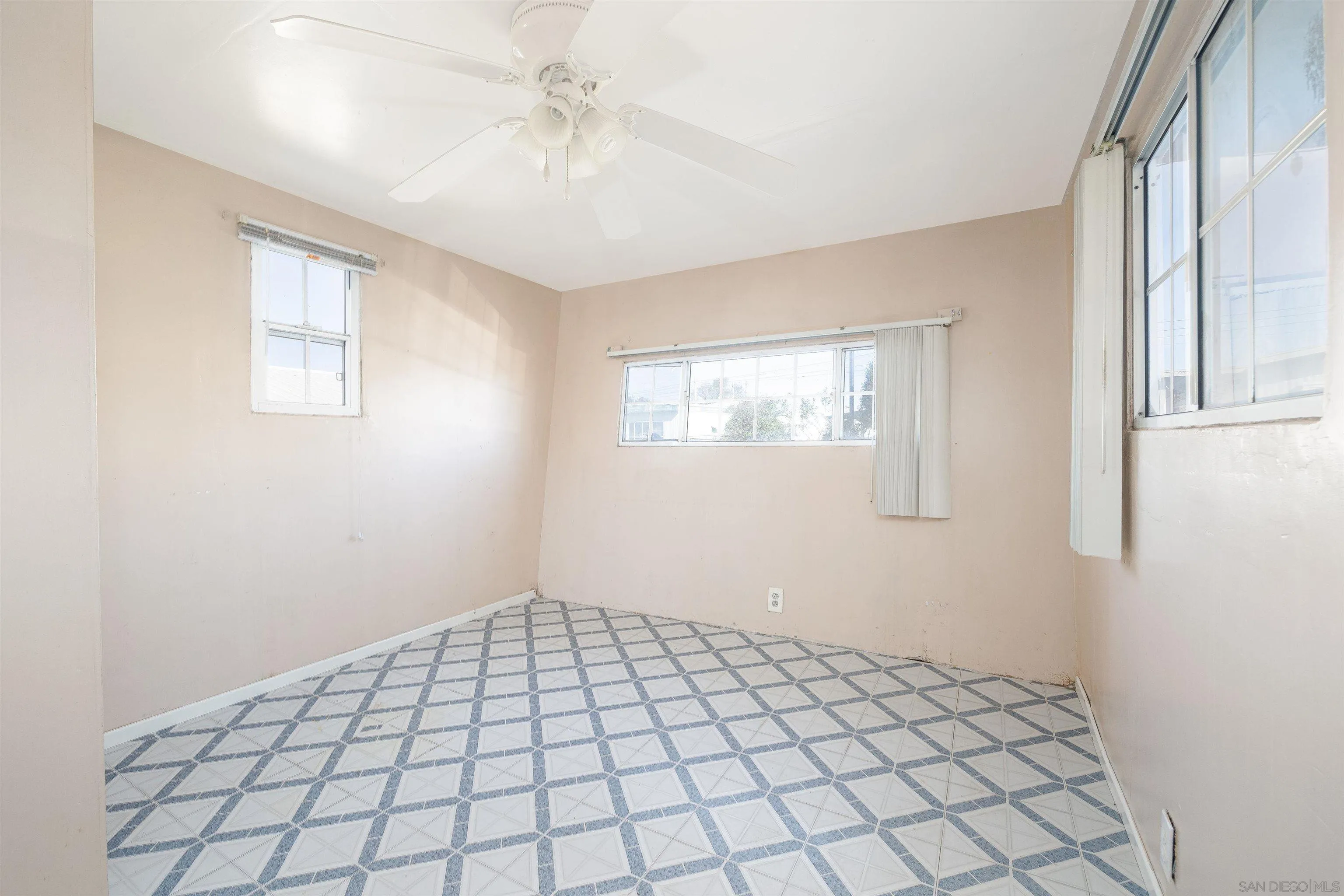 1023 Outer Road, Unit 24 San Diego, CA 92154 - Photo 11 of 16 a view of an empty room and window
