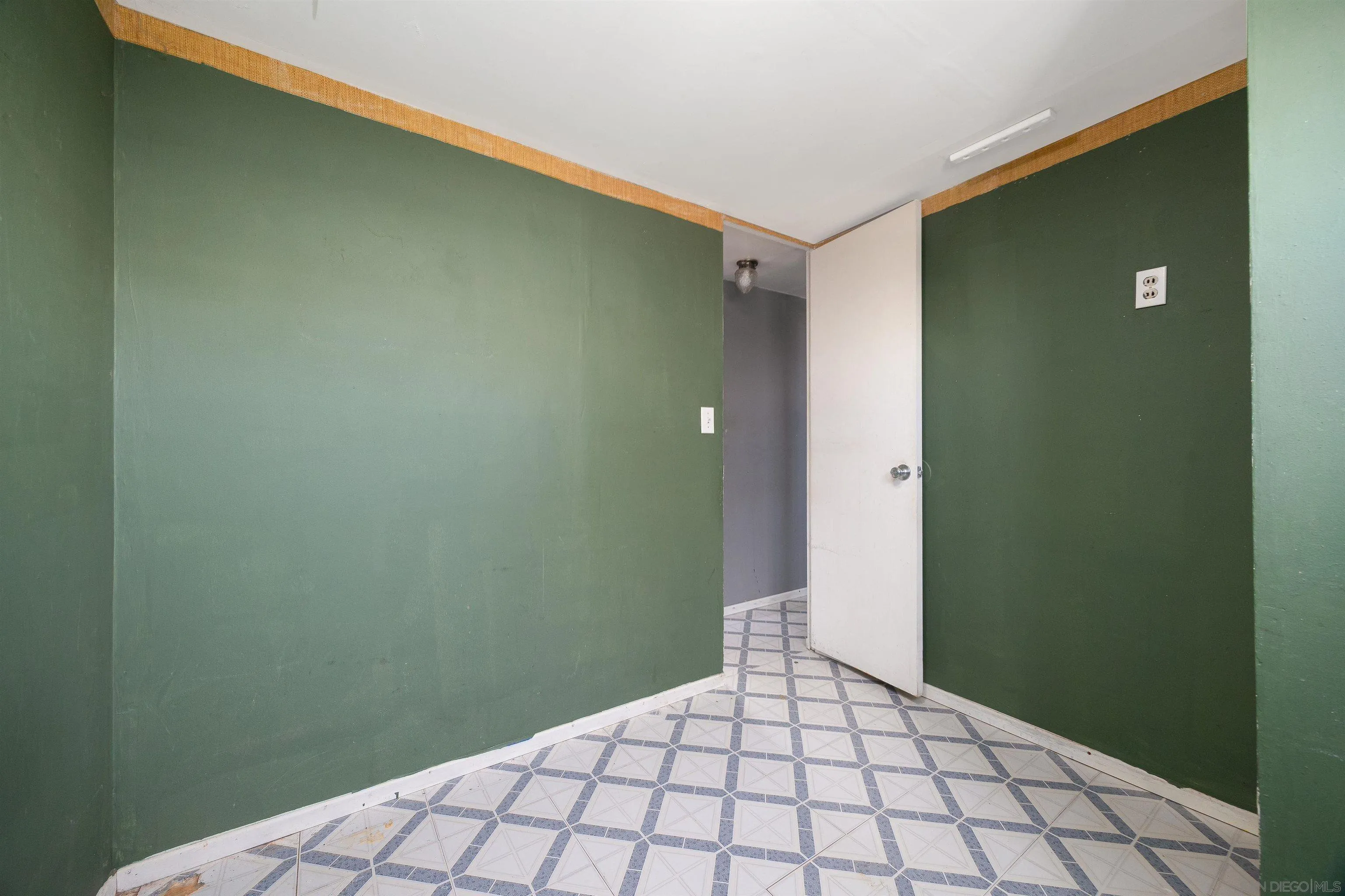1023 Outer Road, Unit 24 San Diego, CA 92154 - Photo 10 of 16 a view of a big room with closet and wardrobe