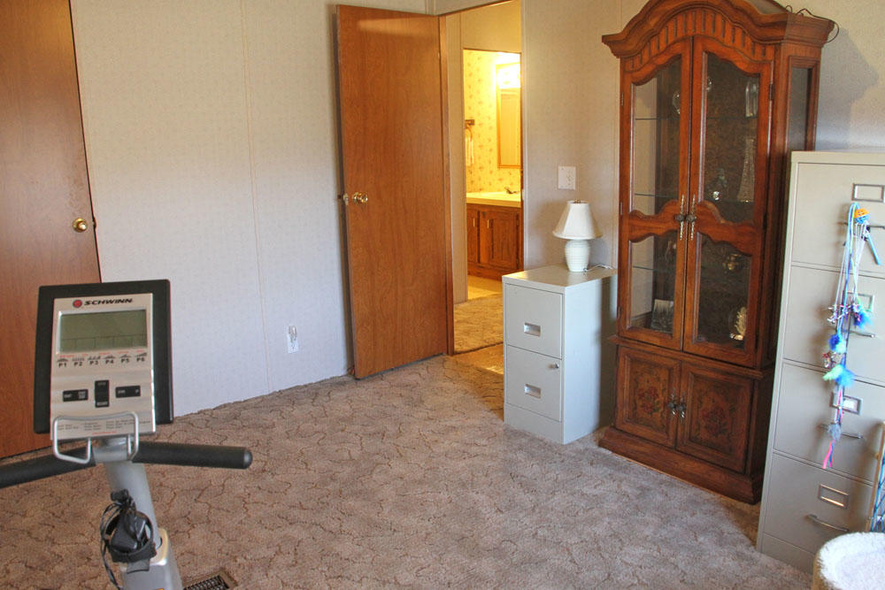 1084 Treasure Lane Blue Ridge, VA 24064 - Photo 25 of 37 wooden floor and window in an empty room