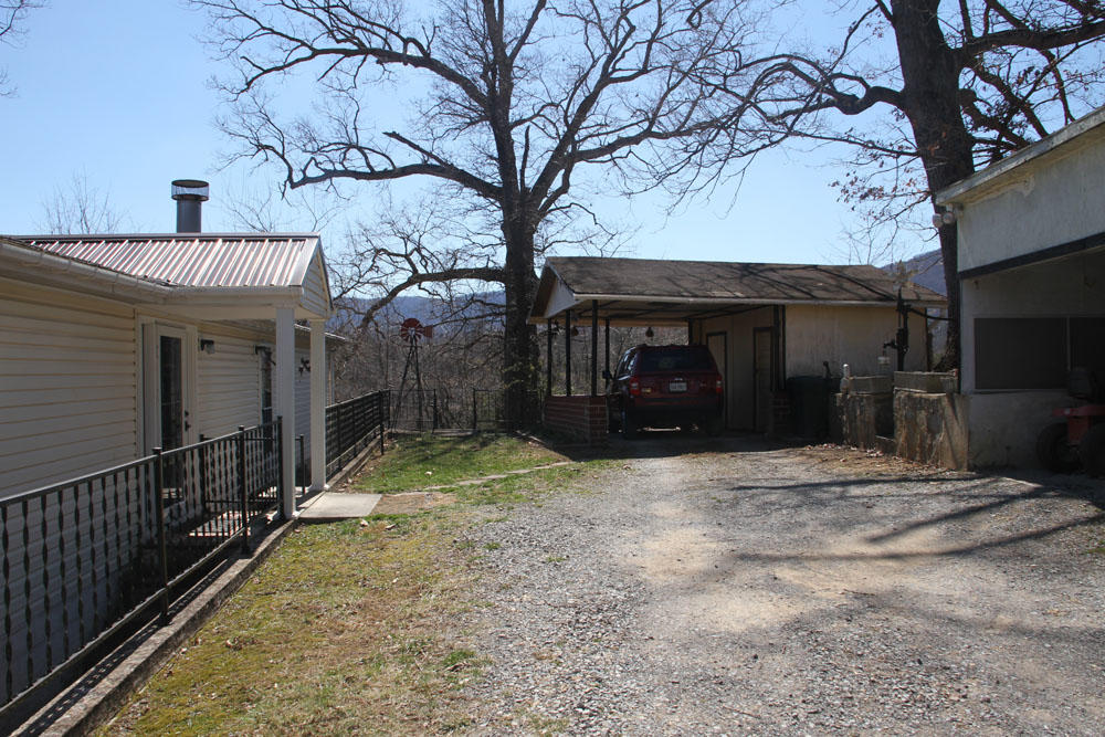 1084 Treasure Lane Blue Ridge, VA 24064 - Photo 35 of 37 a view of a entrance gate of a house