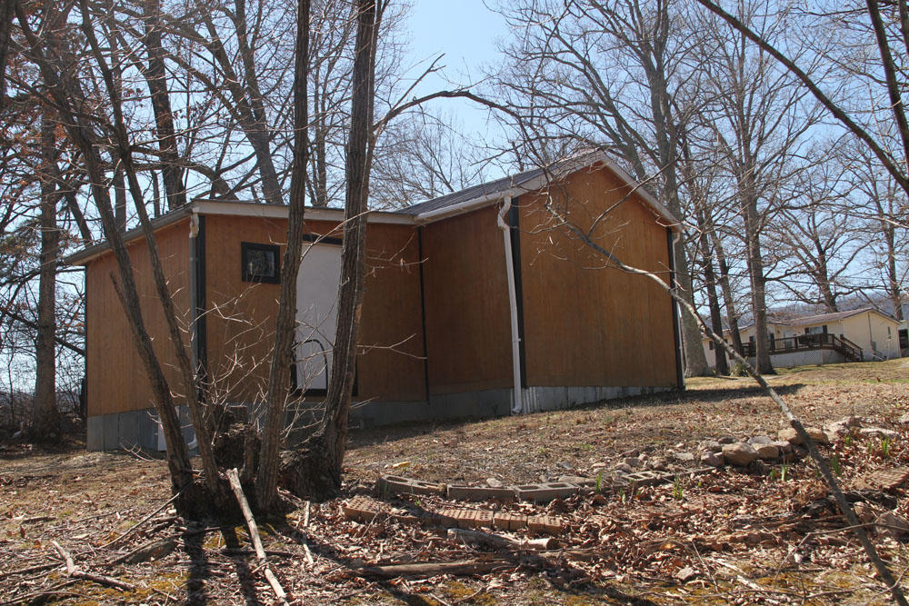 1084 Treasure Lane Blue Ridge, VA 24064 - Photo 36 of 37 a backyard of a house with lots of green space
