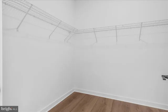 a view of a room with racks on the wall