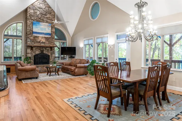 a view of a livingroom with furniture window and wooden floor