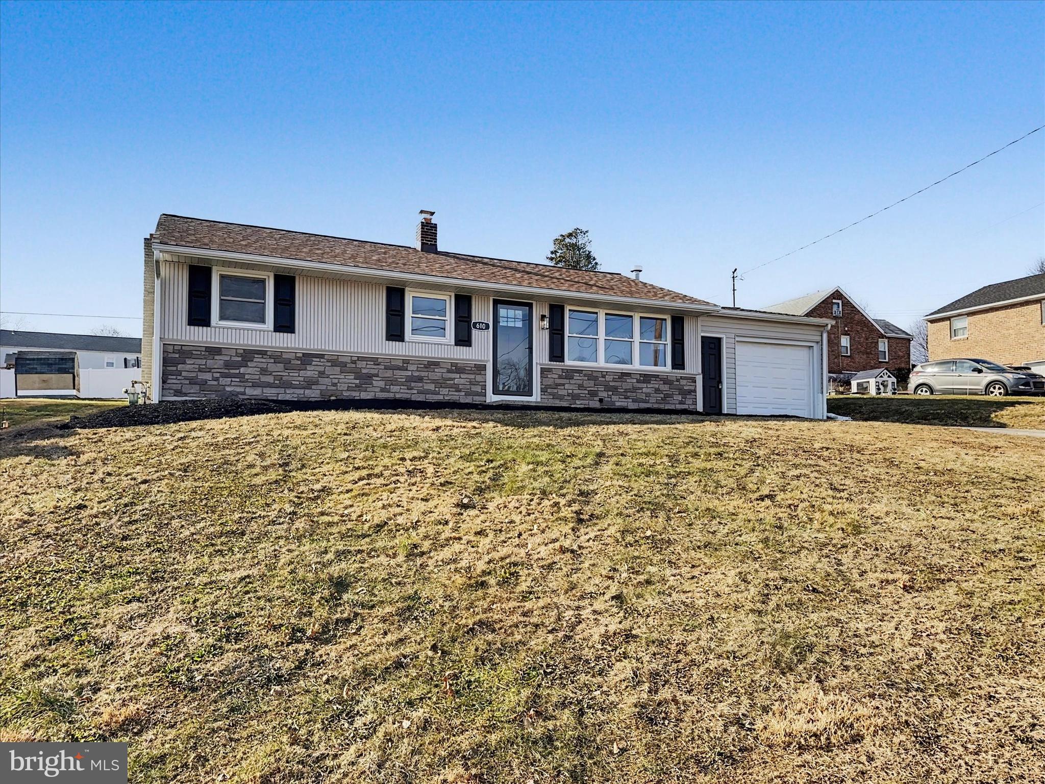 610 Memory Lane Red Lion, PA 17356 - Photo 23 of 23 a front view of a house with a yard