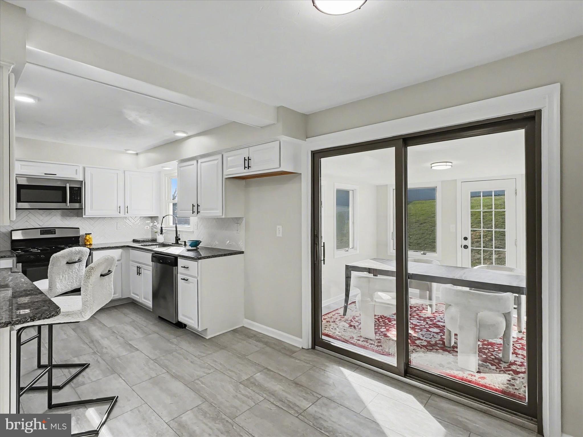 610 Memory Lane Red Lion, PA 17356 - Photo 8 of 23 a kitchen that has a lot of cabinets in it and appliances