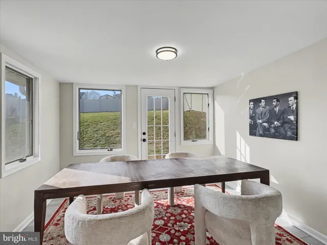 a view of a livingroom with furniture and window