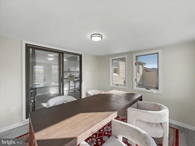 a living room with furniture and window