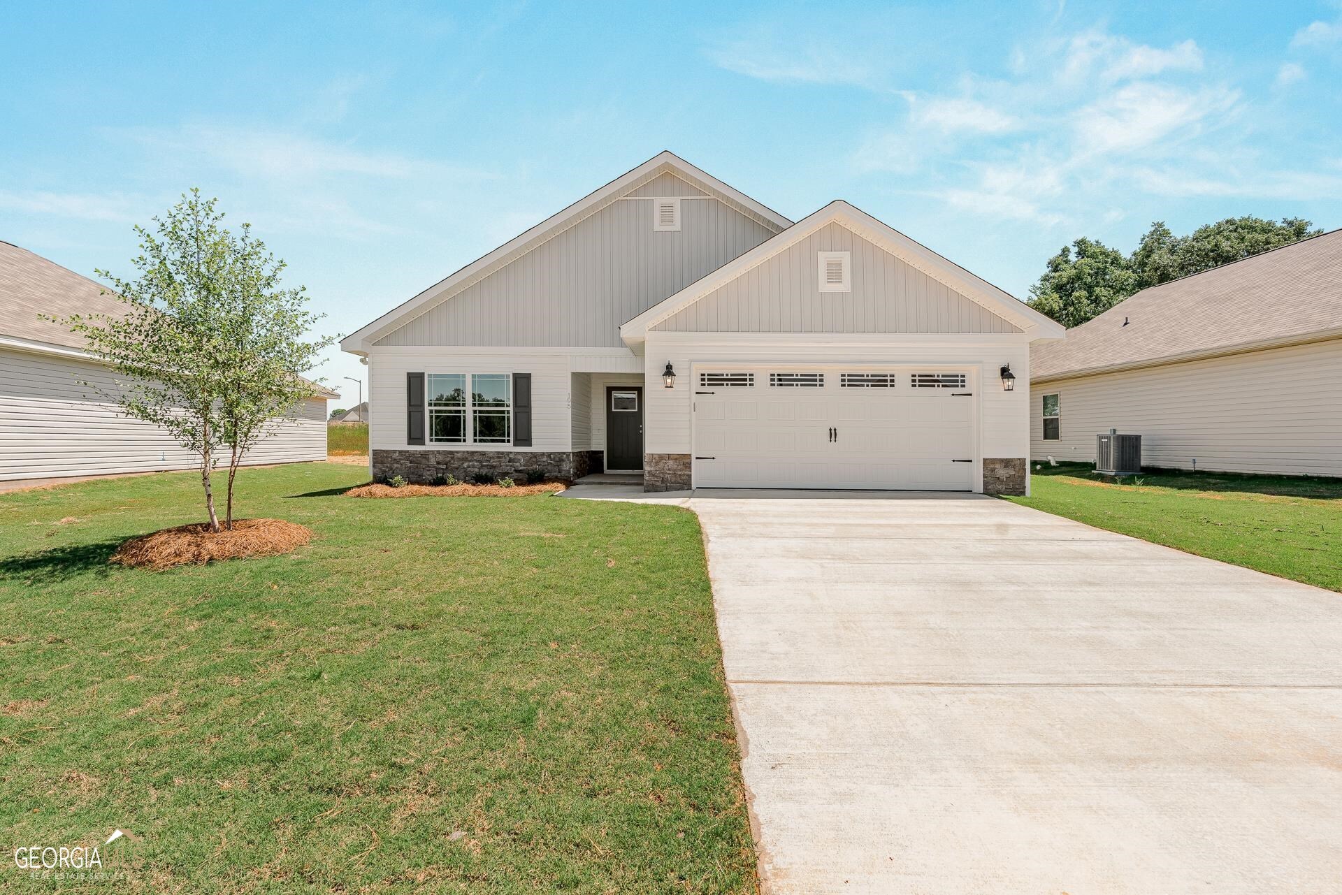 195 Red Tail Circle Byron, GA 31008 - Photo 1 of 1 a view of a house with a yard and large tree