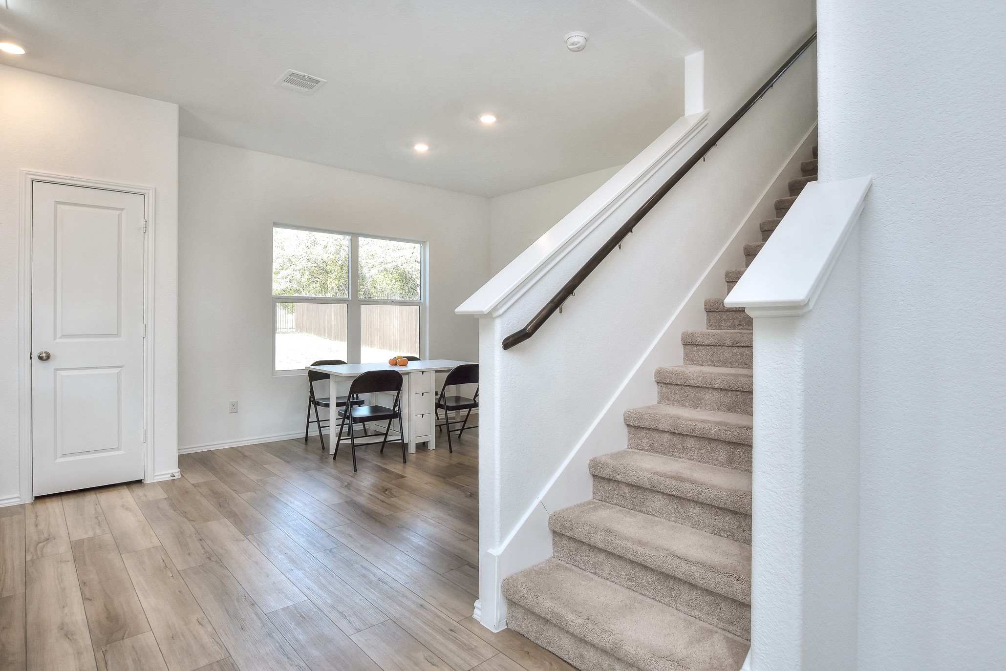 2221 Four Waters Loop Georgetown, TX 78628 - Photo 11 of 40 Stairwell/Dining Area