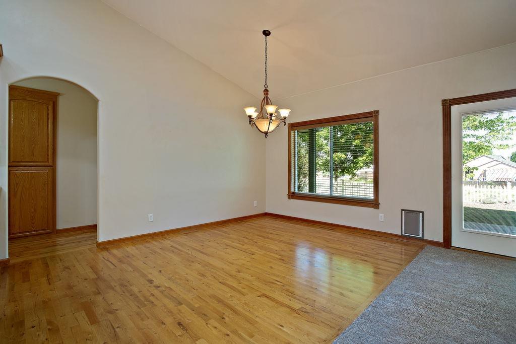914 Ridgeview Drive Eagle Point, OR 97524 - Photo 15 of 34 a view of a room with window wooden floor and front door