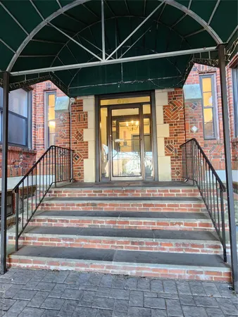 a view of entryway with a front door