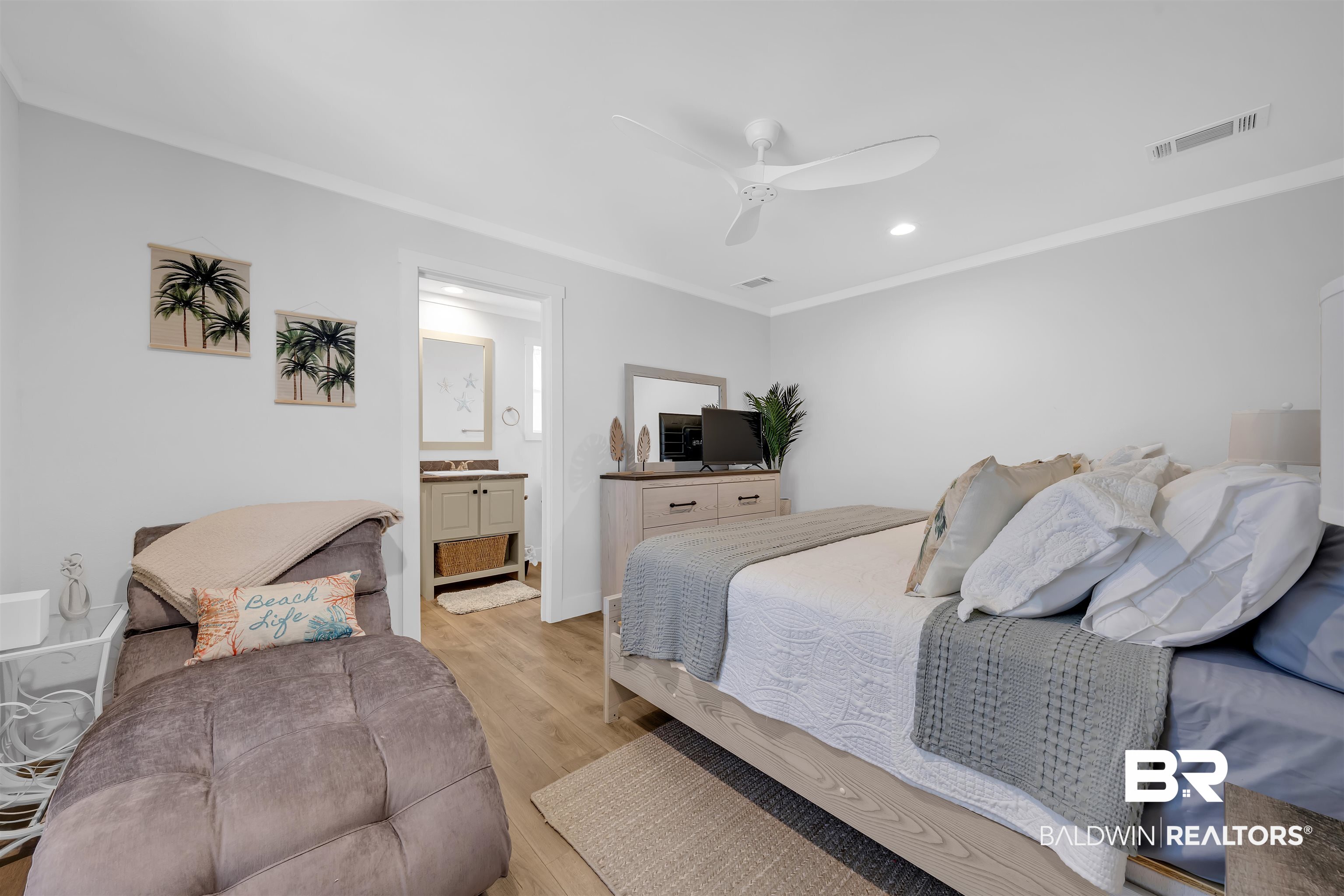 16707 Fort Morgan Road Gulf Shores, AL 36542 - Photo 11 of 22 Bedroom featuring wood finished floors, ornamental molding, ceiling fan, recessed lighting, and ensuite bathroom