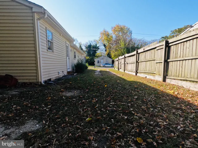 a view of backyard with green space