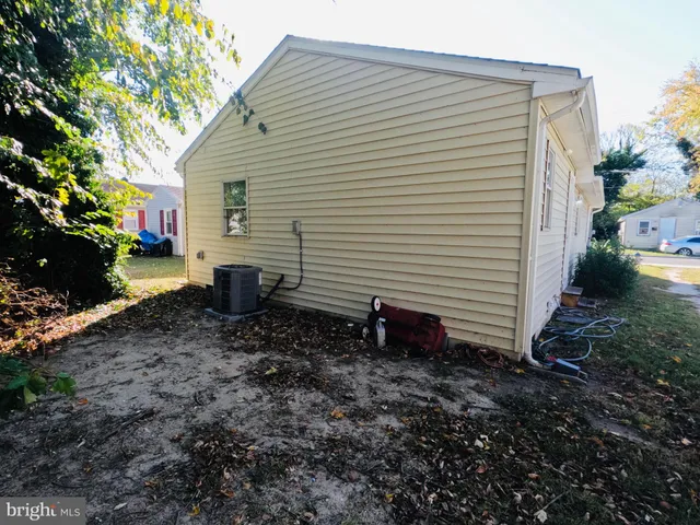 a view of a back yard of the house