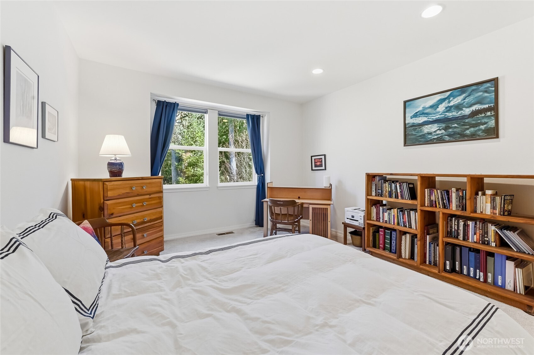 24264 Northeast Vine Maple Way Redmond, WA 98053 - Photo 11 of 31 a bed room with a bed and a book shelf
