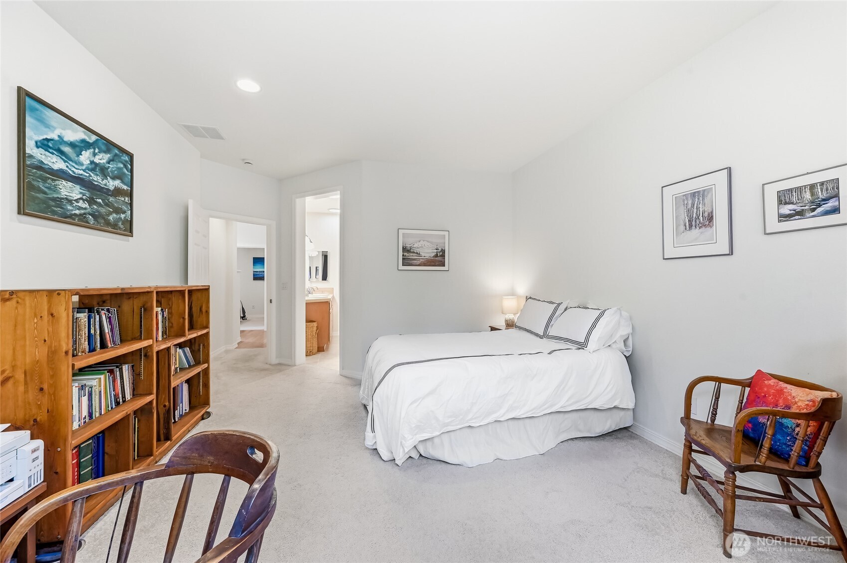 24264 Northeast Vine Maple Way Redmond, WA 98053 - Photo 12 of 31 a bedroom with a bed furniture and a book shelf