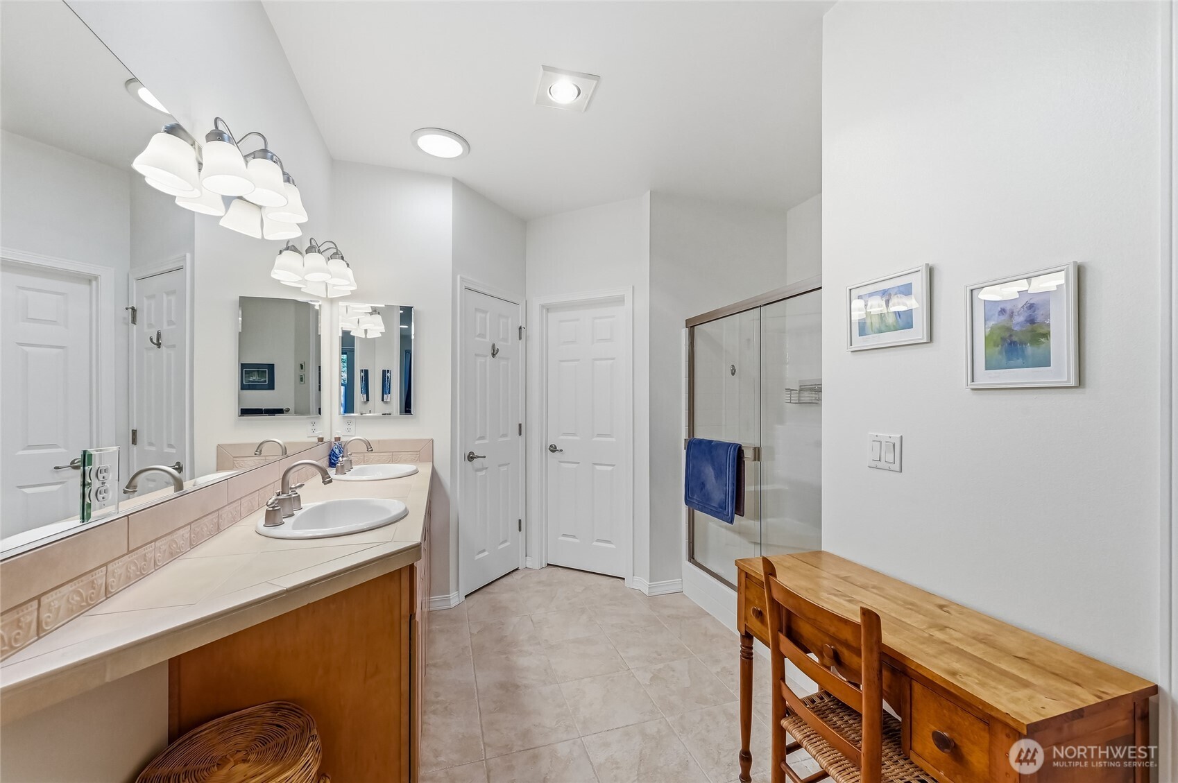 24264 Northeast Vine Maple Way Redmond, WA 98053 - Photo 13 of 31 a spacious bathroom with a granite countertop sink a mirror and a shower
