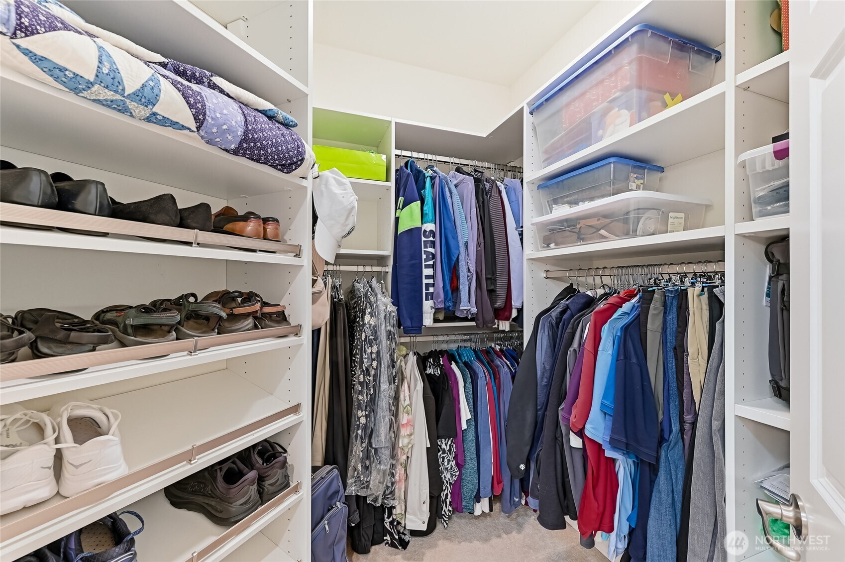 24264 Northeast Vine Maple Way Redmond, WA 98053 - Photo 15 of 31 a view of walk in closet with clothes and shoes