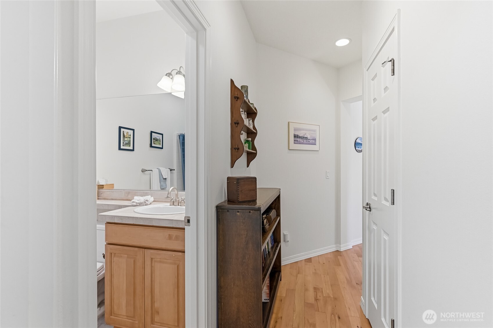 24264 Northeast Vine Maple Way Redmond, WA 98053 - Photo 18 of 31 a bathroom with a sink and a mirror