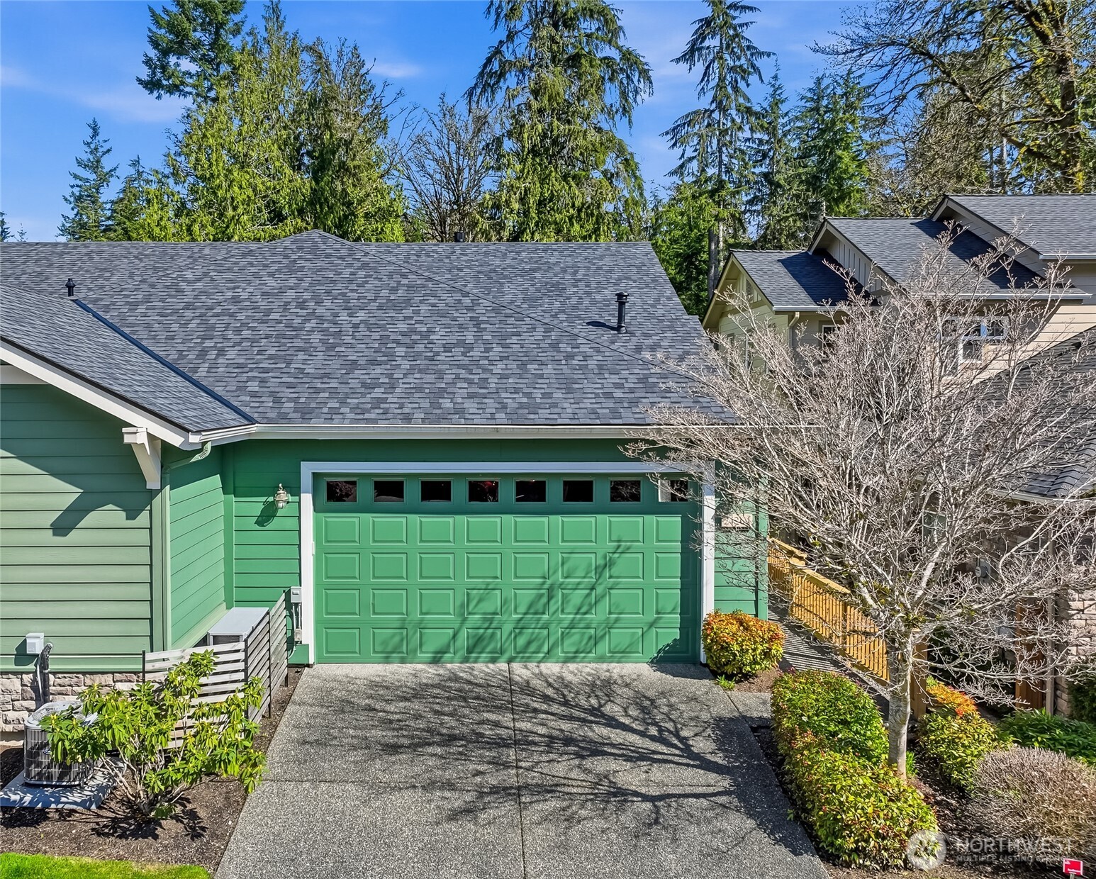 24264 Northeast Vine Maple Way Redmond, WA 98053 - Photo 27 of 31 a view of a backyard with a garden