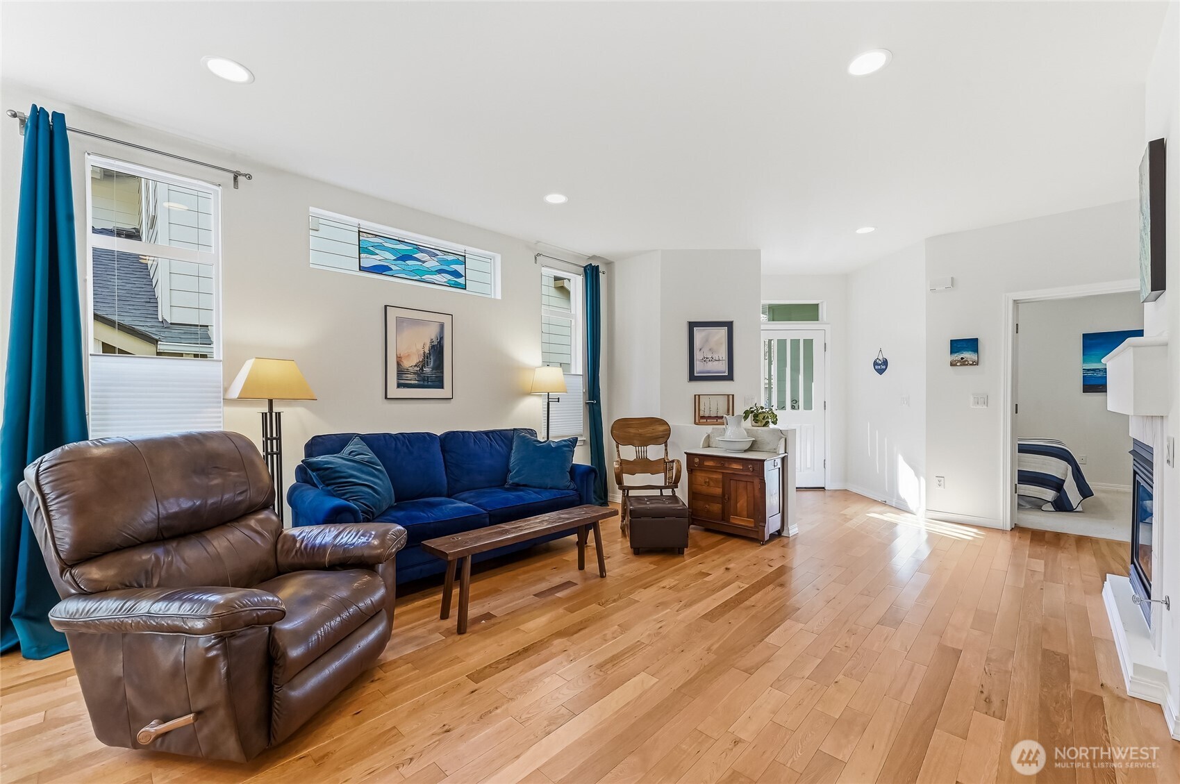 24264 Northeast Vine Maple Way Redmond, WA 98053 - Photo 7 of 31 a living room with furniture and a wooden floor