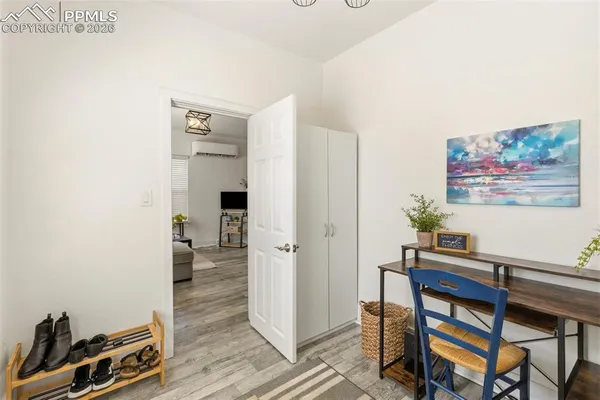 a bathroom with a sink a toilet and shower curtain