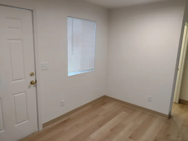 a view of a room that has a window in it
