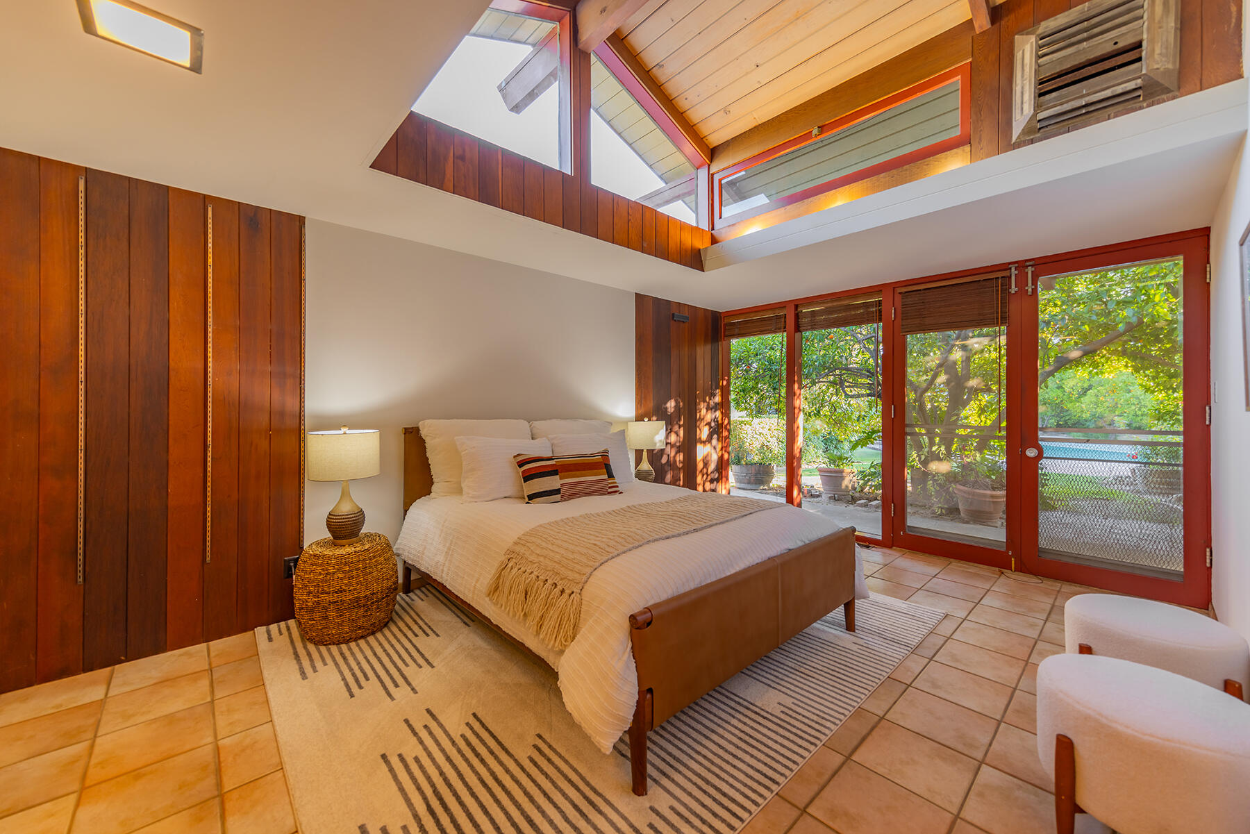 217 Sierra Road Ojai, CA 93023 - Photo 3 of 50 a bedroom with a large bed and a large window