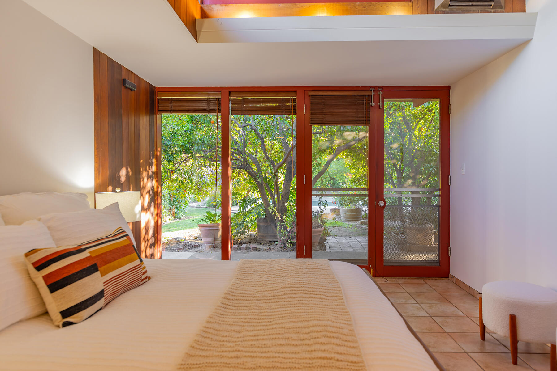 217 Sierra Road Ojai, CA 93023 - Photo 31 of 50 a bedroom with a bed and a large window