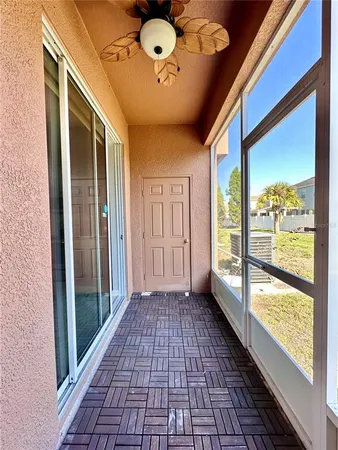 a view of a room with a large window
