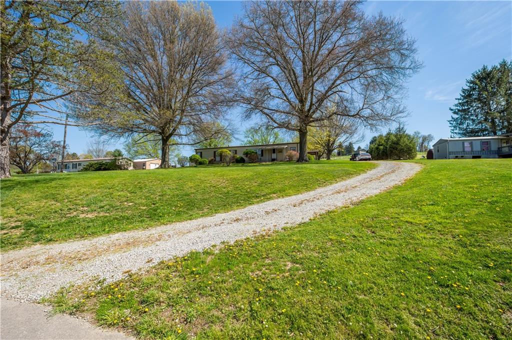 269 Rainey Road Eighty Four, PA 15330 - Photo 2 of 28 a view of a park with a large tree