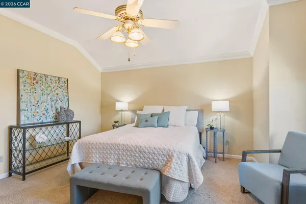 a spacious bathroom with a tub sink shower and mirror