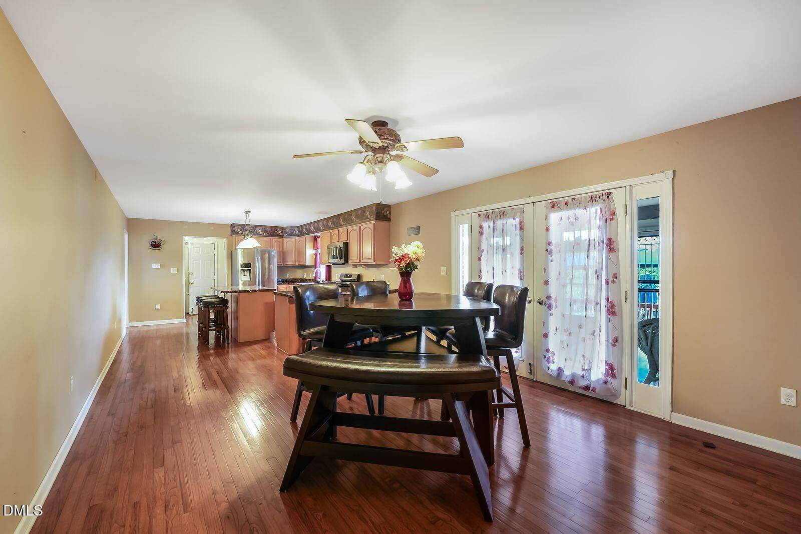 376-t K T K Allen Road Louisburg, NC 27549 - Photo 11 of 49 a living room with furniture and a wooden floor