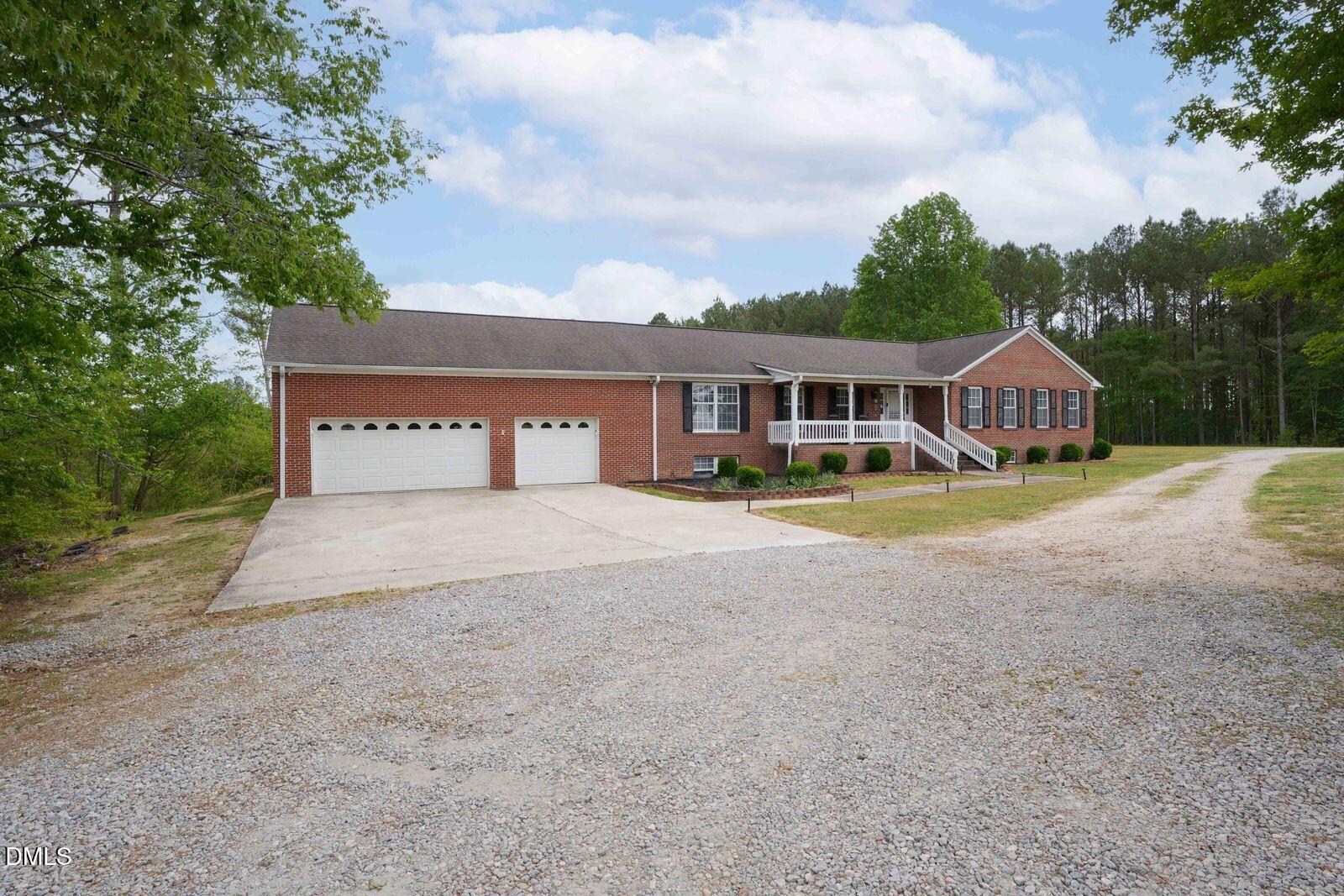 376-t K T K Allen Road Louisburg, NC 27549 - Photo 2 of 49 front view of a house with a yard