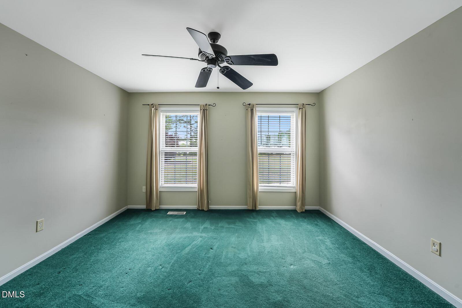 376-t K T K Allen Road Louisburg, NC 27549 - Photo 21 of 49 a view of room with window and ceiling fan