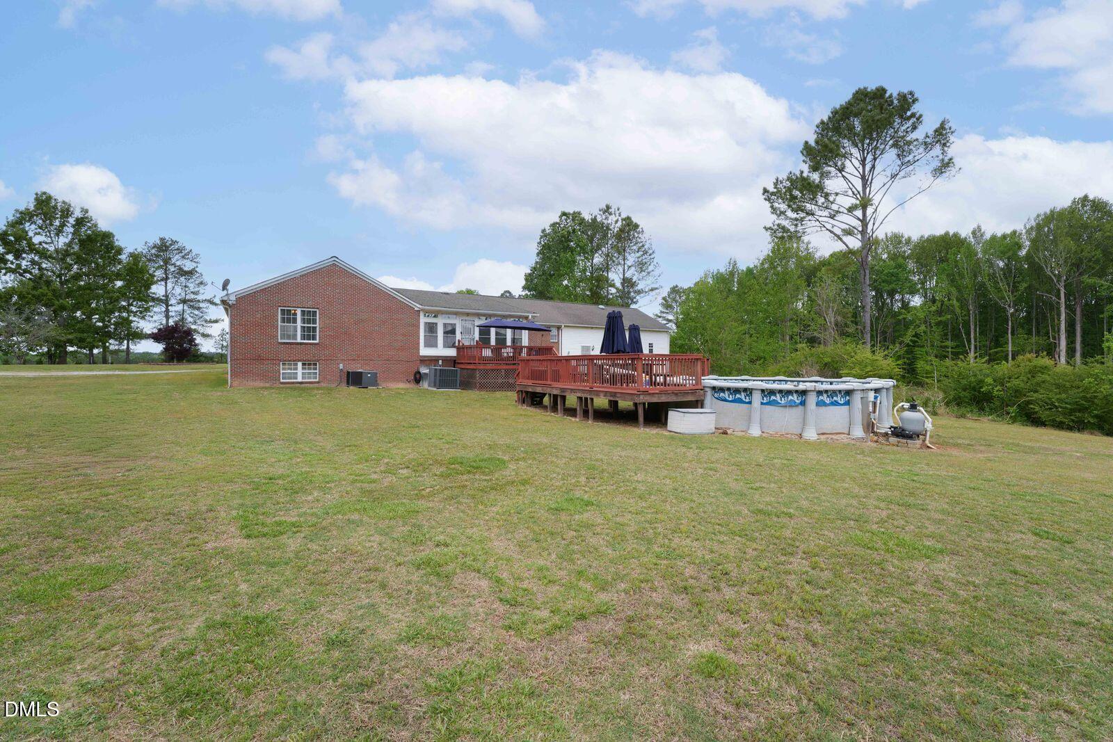 376-t K T K Allen Road Louisburg, NC 27549 - Photo 37 of 49 a house view with a garden space