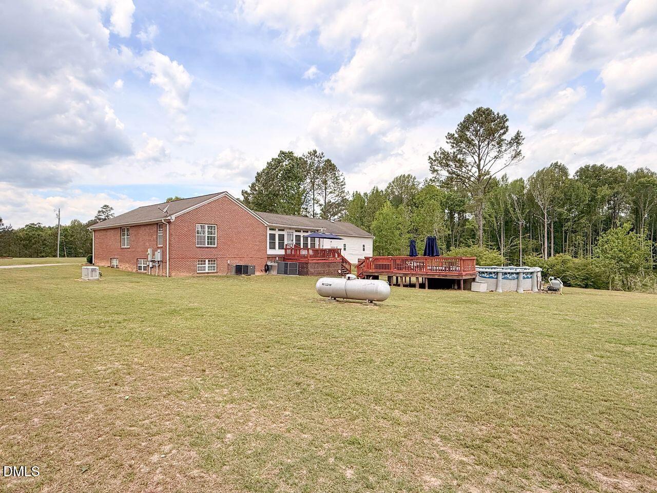 376-t K T K Allen Road Louisburg, NC 27549 - Photo 38 of 49 a front view of a house with garden