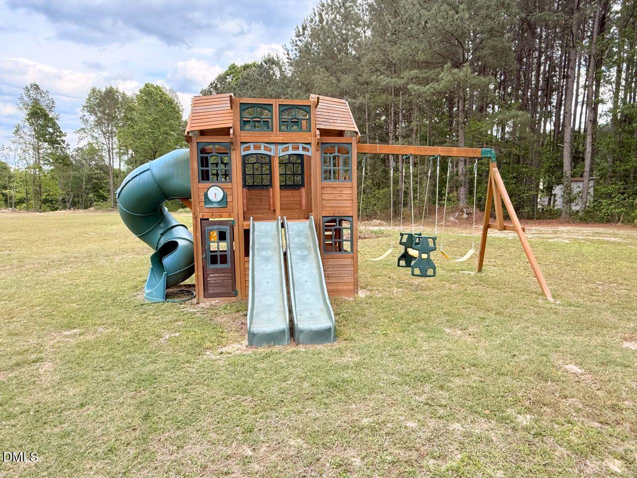 376-t K T K Allen Road Louisburg, NC 27549 - Photo 39 of 49 a house view with a backyard space