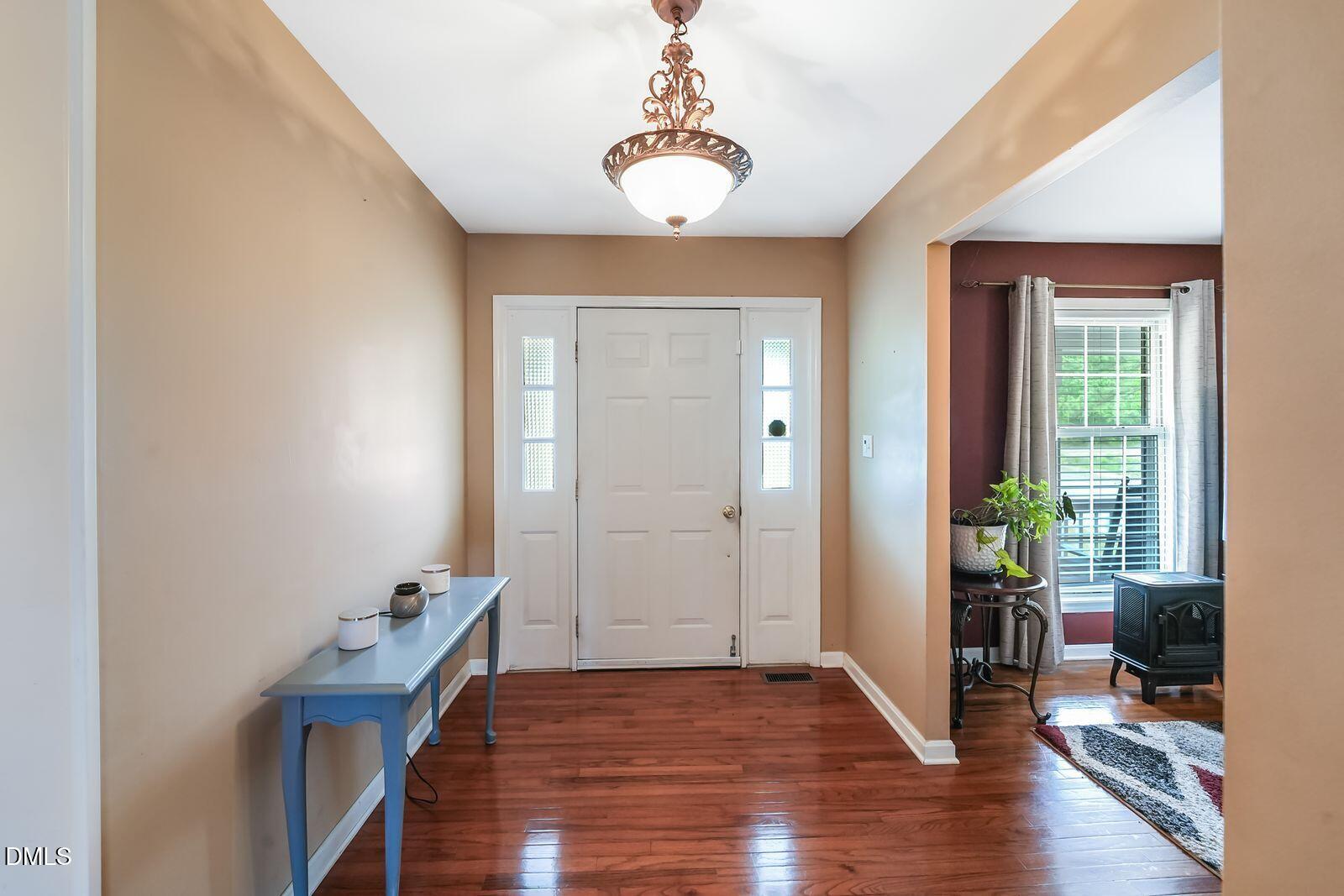 376-t K T K Allen Road Louisburg, NC 27549 - Photo 4 of 49 a room that has a window and wooden floor