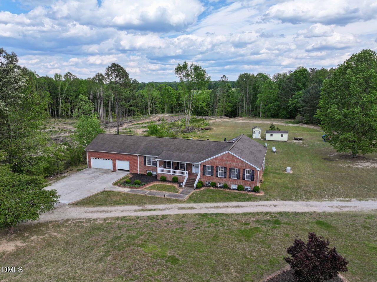 376-t K T K Allen Road Louisburg, NC 27549 - Photo 45 of 49 an aerial view of residential houses with outdoor space and trees