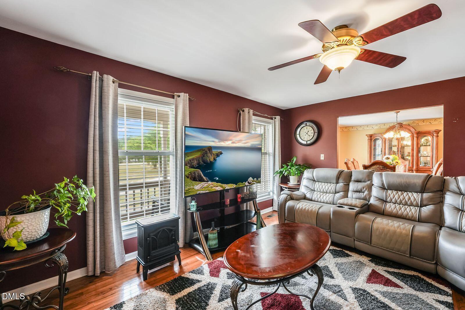 376-t K T K Allen Road Louisburg, NC 27549 - Photo 6 of 49 a living room with furniture a chandelier and a window