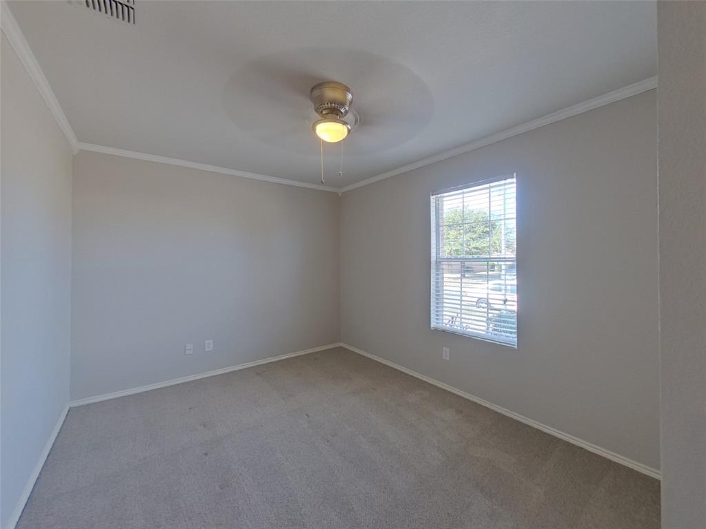 1448 Castle Ridge Road Fort Worth, TX 76140 - Photo 11 of 16 an empty room with a window