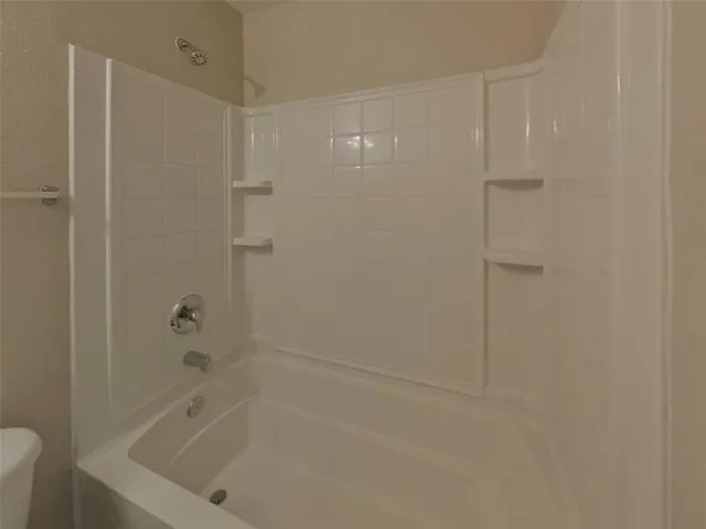 a bathroom with a bathtub