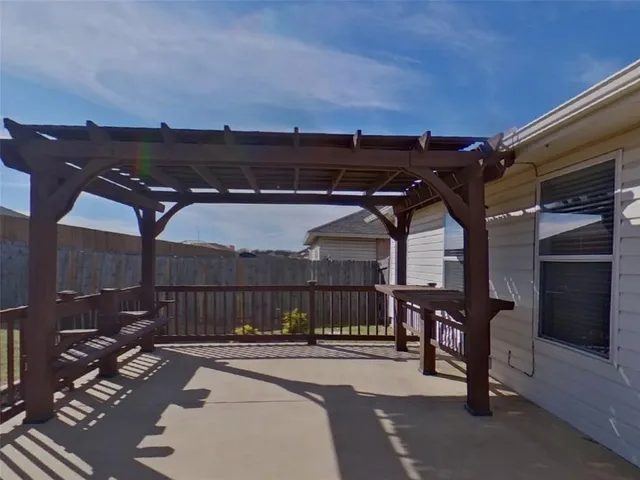 a view of a terrace with furniture