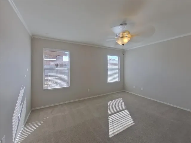 a view of wooden floor and workspace in a room