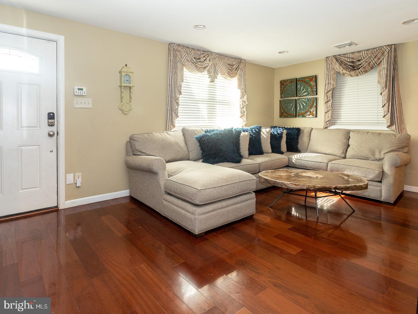 Front Entry leads to a Formal Sitting Room