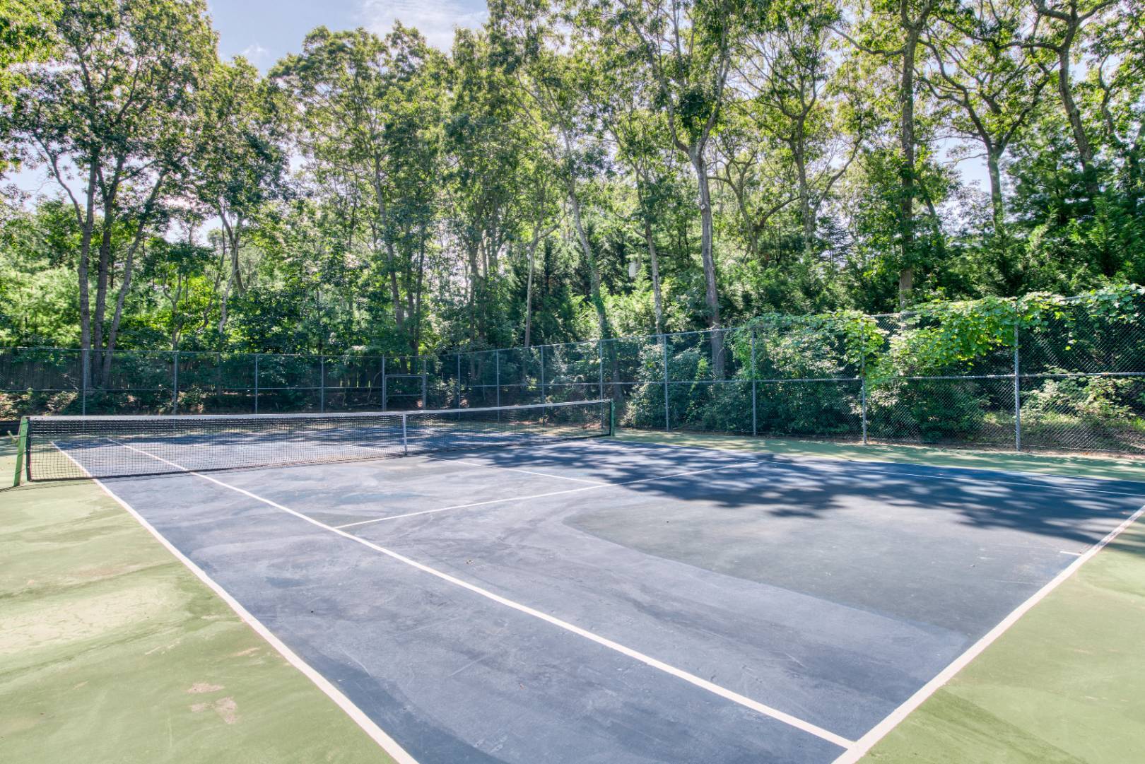 1532 Noyack Road Southampton, NY 11968 - Photo 14 of 15 a view of a yard