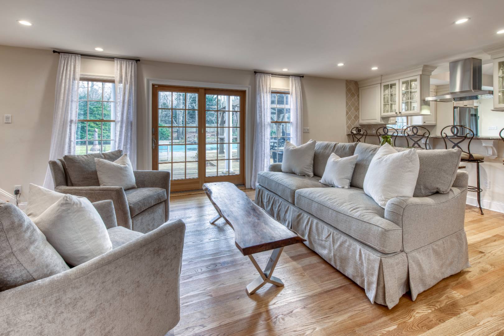 1532 Noyack Road Southampton, NY 11968 - Photo 5 of 15 a living room with furniture and a large window